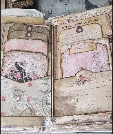 Journal page with layered pockets, inserts and tags