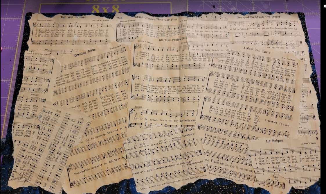 Open journal spread made from vintage sheet music pages